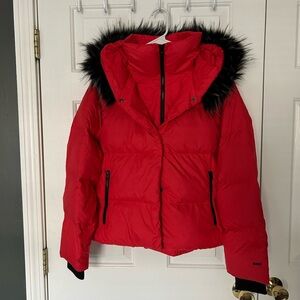 The North Face Red Women’s Puffer Jacket with Black Fur Trim